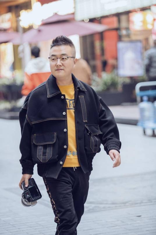 田斌（西安自由摄影师，以拍摄普通劳动者工作场景著称）